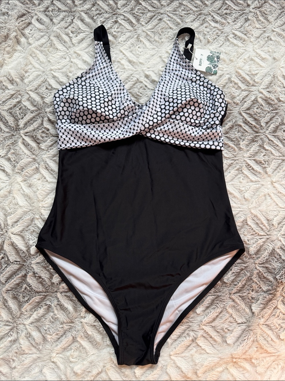 Black One-Piece Swimsuit with White Polka Dot Bust